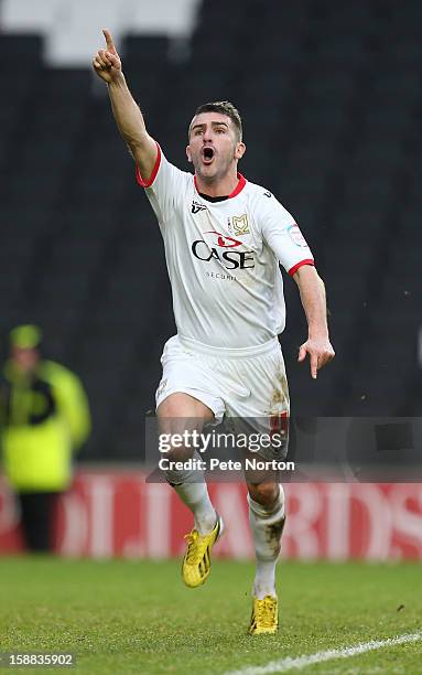Ryan Lowe of Milton Keynes Dons celebrates after scoring his sides 1st goal during the npower League One match between Milton Keynes Dons and...
