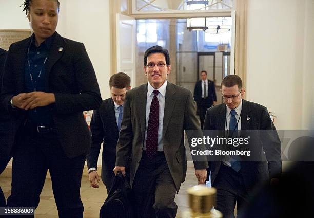 House Majority Leader Eric Cantor, a Republican from Virginia, center, arrives at the U.S. Capitol in Washington, D.C., U.S., on Monday, Dec. 31,...