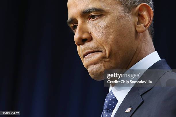 President Barack Obama delivers remarks about the fiscal cliff negotiations in the Eisenhower Executive Office Building next to the White House...