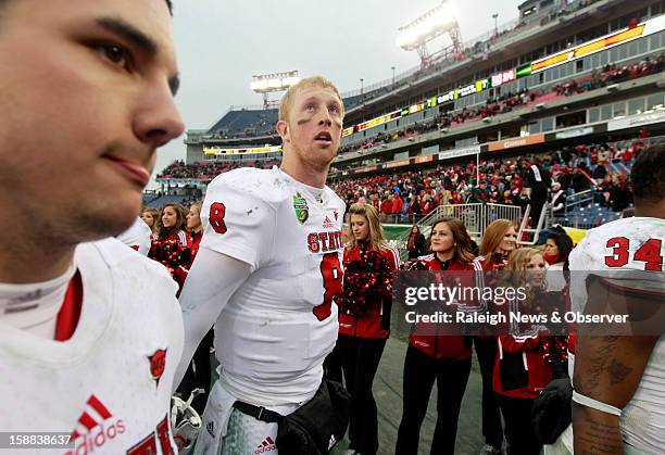 State redshirt senior quarterback Mike Glennon walks off the field after N.C. State's 38-24 loss to Vanderbilt in the Franklin American Mortgage...