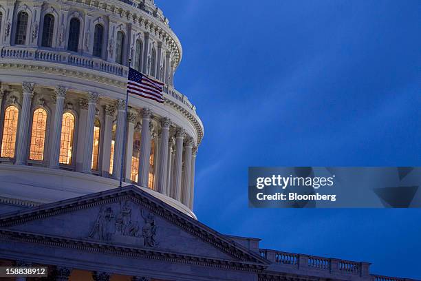 The U.S. Capitol stands in Washington, D.C., U.S., on Monday, Dec. 31, 2012. The U.S. House of Representatives doesn't plan any votes on the federal...