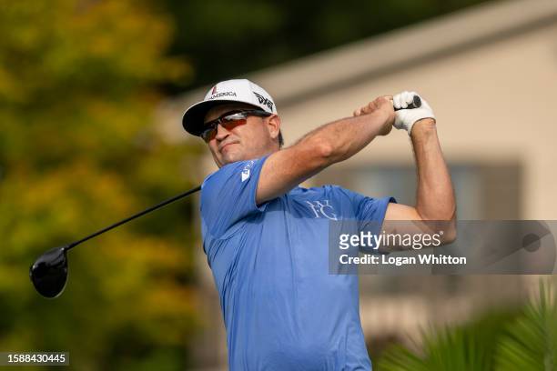 Zach Johnson of the United States tees off on the 17th hole during the pro-am prior to the Wyndham Championship at Sedgefield Country Club on August...