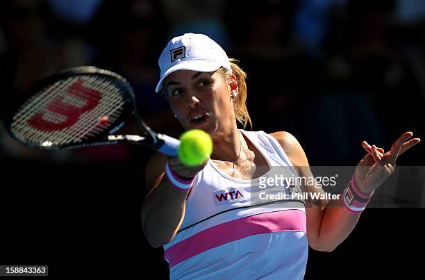 Marina Erakovic of New Zealand plays a forehand in her first round match against Stephanie Dubois of Canada during day two of the 2013 ASB Classic on...