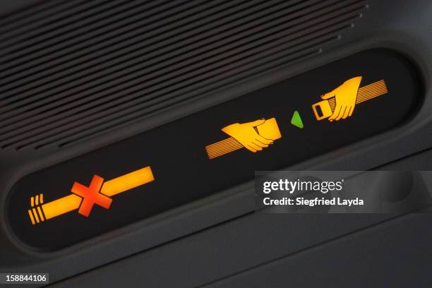 fasten seatbelt and no smoking signs - no smoking sign stock pictures, royalty-free photos & images