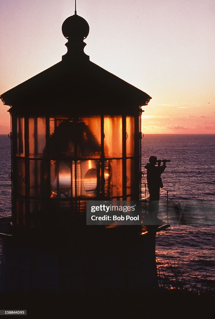 Lighthouse and keeper at sunset