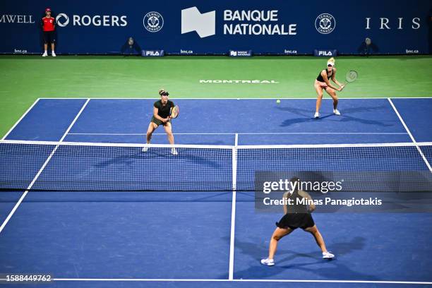Gabriela Dabrowski of Canada and Erin Routliffe of New Zealand compete in their doubles match against Latisha Chan of Chinese Taipei and Zhaoxuan...
