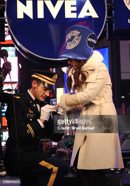 John Cebak surprised his girlfriend Sonja Babic with a proposal on the NIVEA Kiss Stage in Times Square on New Year's Eve 2013 on December 31, 2012...