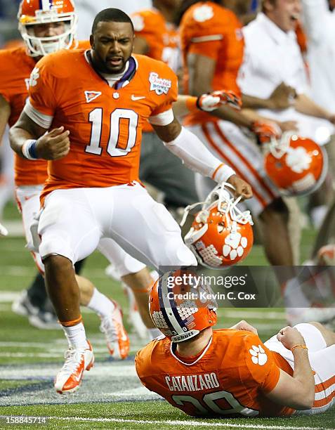 Chandler Catanzaro of the Clemson Tigers reacts after kicking the game-winning field goal against the LSU Tigers during the 2012 Chick-fil-A Bowl at...