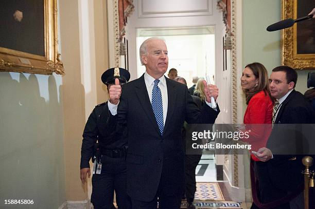 Vice President Joe Biden speaks to the media following a Democratic caucus meeting at the U.S. Capitol in Washington, D.C., U.S., on Monday, Dec. 31,...