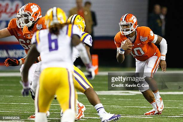 Tajh Boyd of the Clemson Tigers rushes against the LSU Tigers during the 2012 Chick-fil-A Bowl at Georgia Dome on December 31, 2012 in Atlanta,...