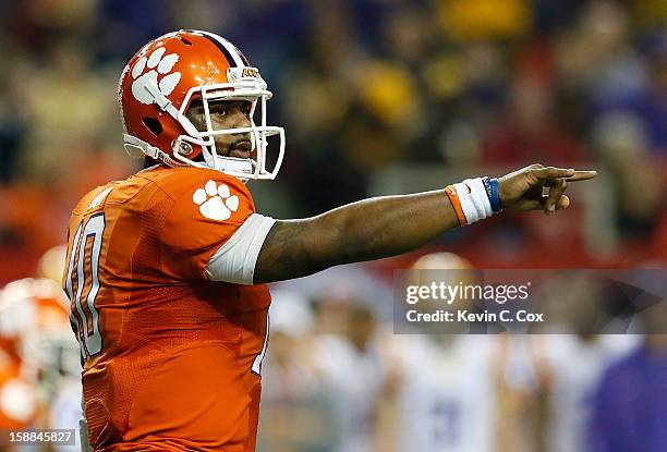 Tajh Boyd of the Clemson Tigers points to the LSU Tigers defense during the 2012 Chick-fil-A Bowl at Georgia Dome on December 31, 2012 in Atlanta,...