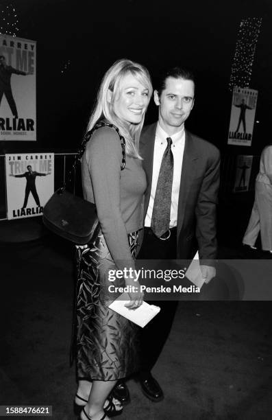 Sylvie Anderson and C. Thomas Howell attend the local premiere of "Liar Liar" at the Universal Amphitheatre in Los Angeles, California, on March 18,...