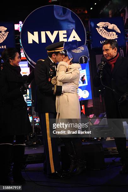 Mario Lopez and Courtney Lopez were on hand to co-host the NIVEA Kiss Stage in Times Square on New YearÕs Eve 2013, where John Cebak surprised his...