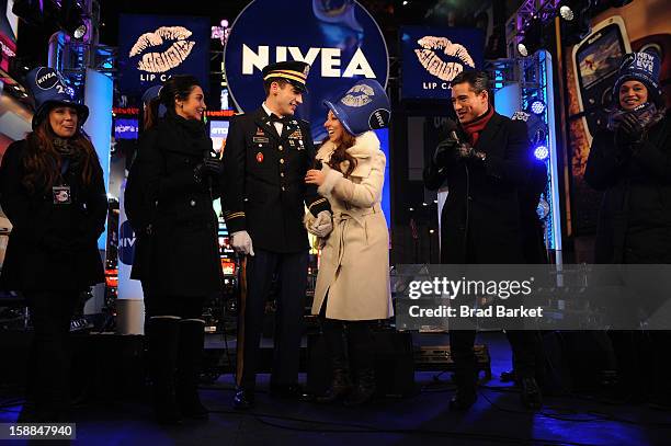 Mario Lopez and Courtney Lopez were on hand to co-host the NIVEA Kiss Stage in Times Square on New YearÕs Eve 2013, where John Cebak surprised his...