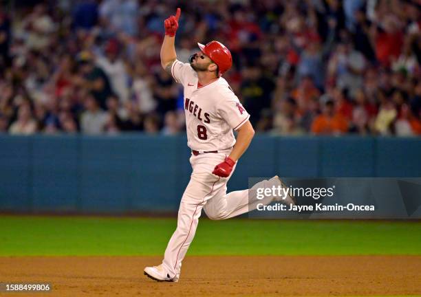 Mike Moustakas of the Los Angeles Angels rounds the bases on his three-run home run in the sixth inning against the San Francisco Giants at Angel...