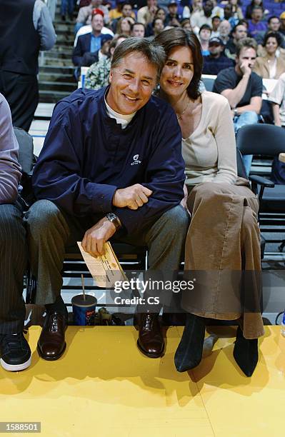 Actor Don Johnson and his wife, Kelley, watch the Los Angeles Lakers take on the Milwaukee Bucks during the NBA preseason game at Staples Center on...