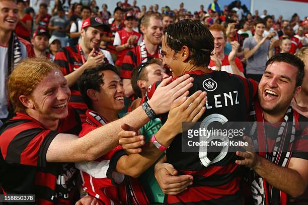 Jerome Polenz of the Wanderers celebrates with the crowd after victory in the round 14 A-League match between the Western Sydney Wanderers and the...