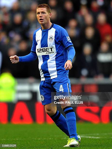 Wigan Athletic's Scottish-born Irish midfielder James McCarthy in action during the English Premier League football match between Wigan Athletic and...