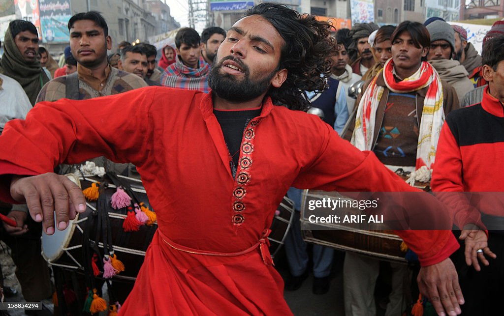 Pakistan Rufi A devotee dances at the shrine of Muslim Sufi Saint Data Ganj Bakhsh ...