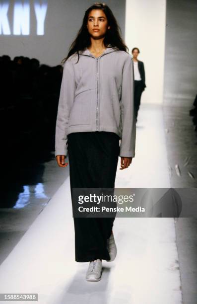 Model Teresa Lourenco walks in the DKNY Fall 1998 Ready to Wear Runway Show on March 29 in New York City.