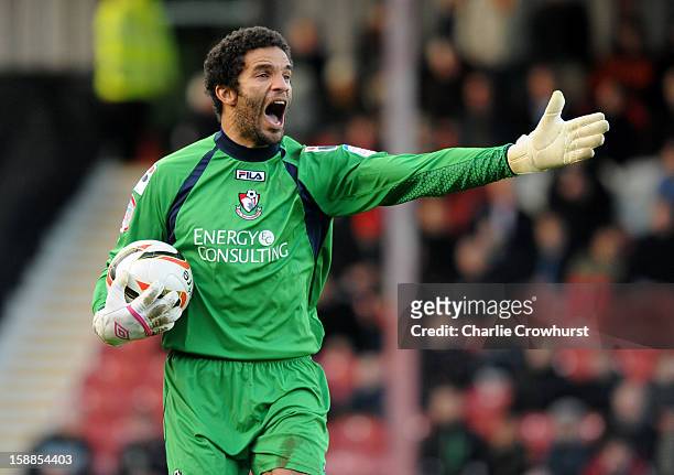 David James of Bournemouth shouts at his defence during the npower League One match between Brentford and Bournemouth at Griffin Park on January 01,...