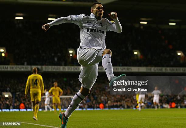 Clint Dempsey of Tottenham Hotspur celebrates scoring their third goal during the Barclays Premier League match between Tottenham Hotspur and Reading...