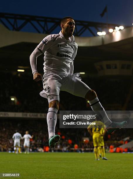 Clint Dempsey of Tottenham Hotspur celebrates scoring their third goal during the Barclays Premier League match between Tottenham Hotspur and Reading...