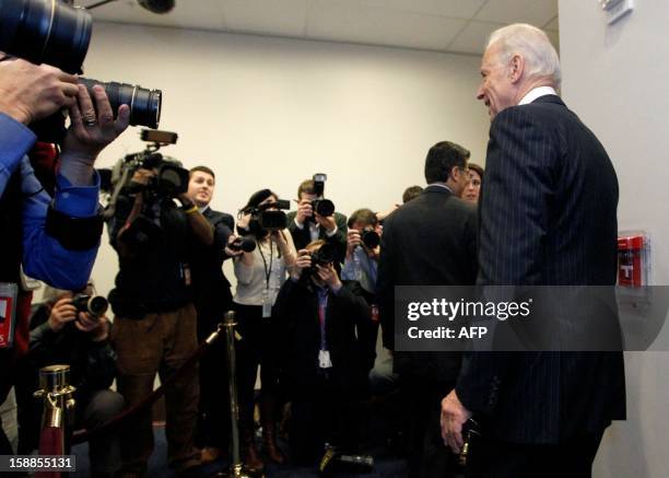 Vice President Joe Biden arrives at the US Capitol to meet with reluctant House Democrats on January 1, 2013 in Washington, DC. Lawmakers in the...