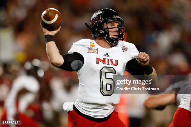 Jordan Lynch of the Northern Illinois Huskies throws a pass in the first half against the Florida State Seminoles during the Discover Orange Bowl at...