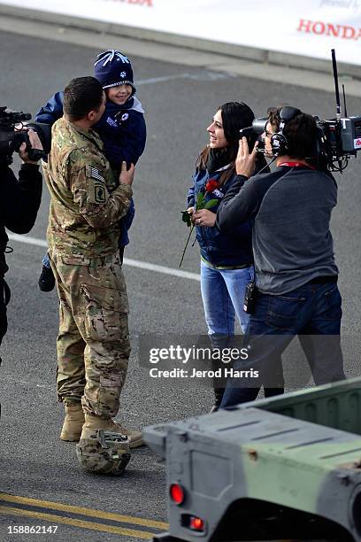 Army Sgt. First Class Eric Pazz surprises wife Miriam and son Eric II during the 124th annual Rose Parade themed "Oh, the Places You'll Go!" on...