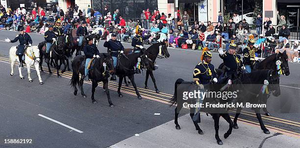 Riders and horses on the parade route during the 124th Rose Parade Presented By Honda on January 1, 2013 in Pasadena, California.