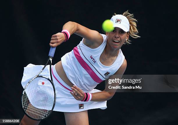 Marina Erakovic of New Zealand serves in her second round match against Jamie Hampton of USA during day three of the 2013 ASB Classic on January 2,...