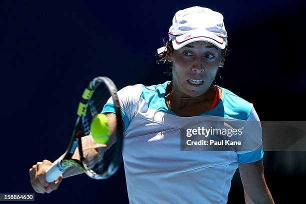 Francesca Schiavone of Italy plays a backhand to Tatjana Malek of Germany in her singles match during day five of the Hopman Cup at Perth Arena on...