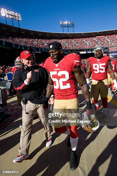 Linebackers Coach Jim Leavitt of the San Francisco 49ers talks with Patrick Willis during the game against the Arizona Cardinals at Candlestick Park...