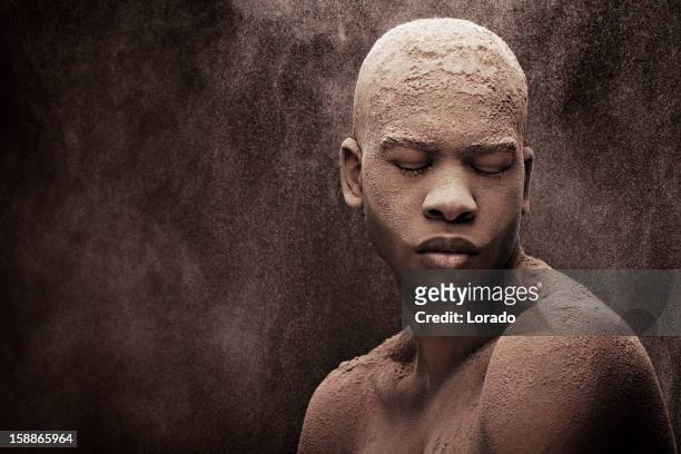 black male model covered with powder - powder snow stock pictures, royalty-free photos & images
