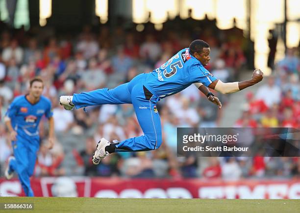 Kieron Pollard of the Strikers takes a catch off his own bowling to dismiss Ben Rohrer of the Renegades during the Big Bash League match between the...