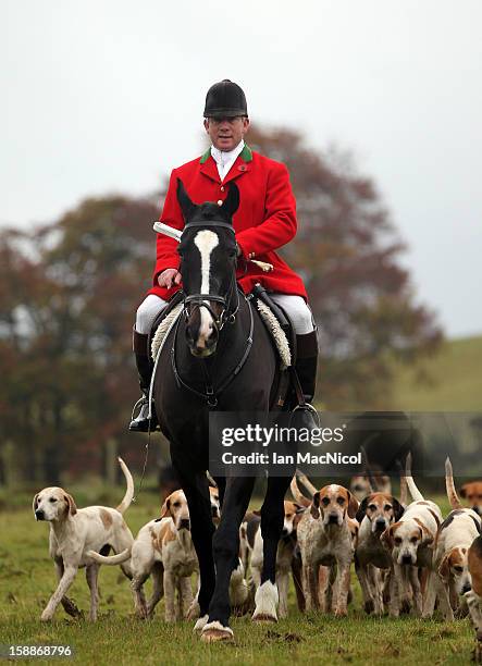 The Duke of Buccleugh's Fox hounds are lead by Master of the Hounds Trevor Adams to take part in a fox hunt on November 08, 2011 in St Boswells,...