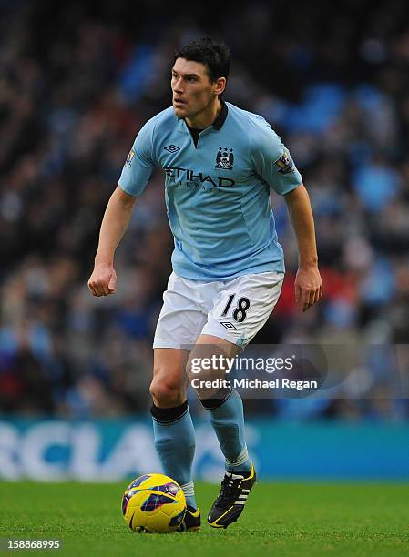 Gareth Barry of Manchester City in action during the Barclays Premier League match between Manchester City and Stoke City at the Etihad Stadium on...