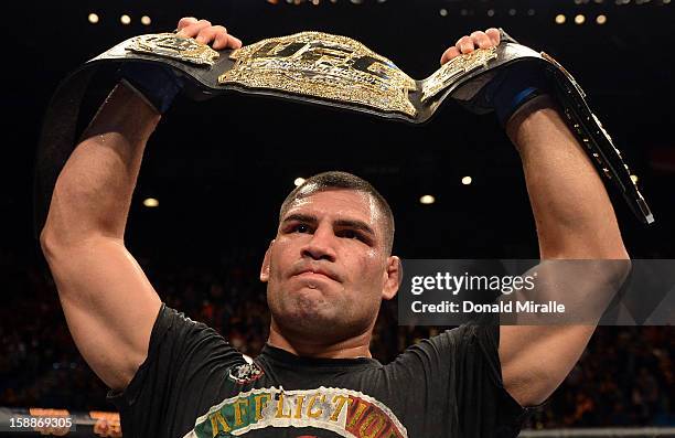 Cain Velasquez reacts after defeating Junior dos Santos during their heavyweight championship fight at UFC 155 on December 29, 2012 at MGM Grand...