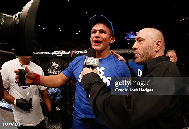 Junior dos Santos is interviewed by Joe Rogan after losing to Cain Velasquez during their heavyweight championship fight at UFC 155 on December 29,...