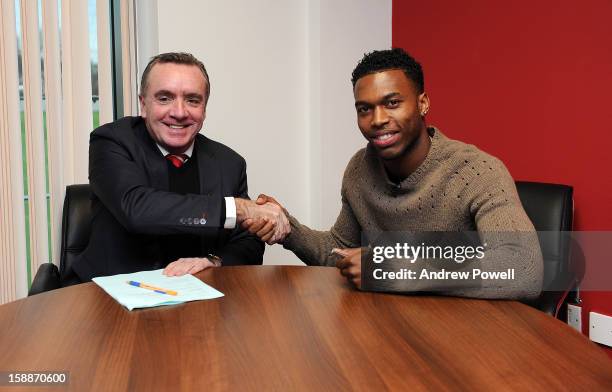 Daniel Sturridge completes his transfer to Liverpool FC with managing director Ian Ayre at Melwood Training Ground on January 2, 2013 in Liverpool,...