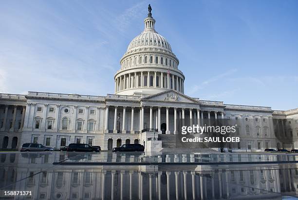 The US Capitol in Washington, DC, on January 2 on the day after a compromise bill passed the US Congress, avoiding the "fiscal cliff." The agreement...