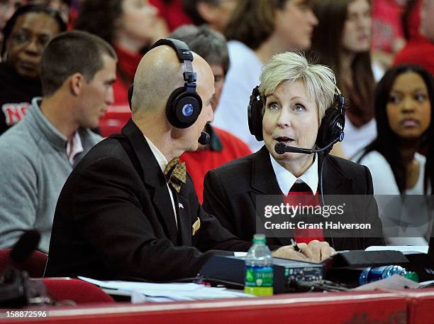 Athletic Director Debbie Yow of the North Carolina State Wolfpack gives a halftime interview during a game against the St. Bonaventure Bonnies at PNC...