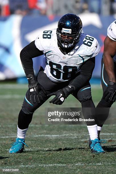 Guy Whimper of the Jacksonville Jaguars plays against the Tennessee Titans at LP Field on December 30, 2012 in Nashville, Tennessee.