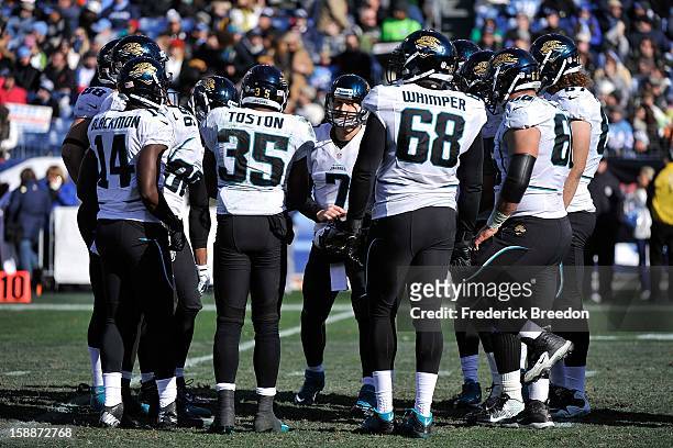 Justin Blackmon, Keith Toston, Chad Henne, and Guy Whimper of the Jacksonville Jaguars huddle during a game against the Tennessee Titans at LP Field...