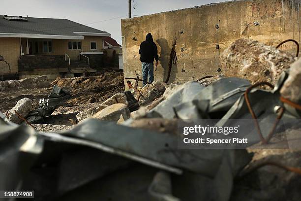 Construction of a new sea wall begins along the beach in the Belle Harbor neighborhood in the Rockaways on January 2, 2013 in the Queens borough of...