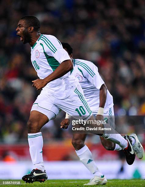 Onazi Ogenyi of Nigeria celebrates after scoring his team's first goal during a friendly match between Catalonia and Nigeria at Cornella-El Prat...