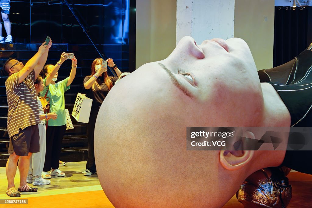 Giant Human Sculpture Appears In Shanghai's Shopping Mall