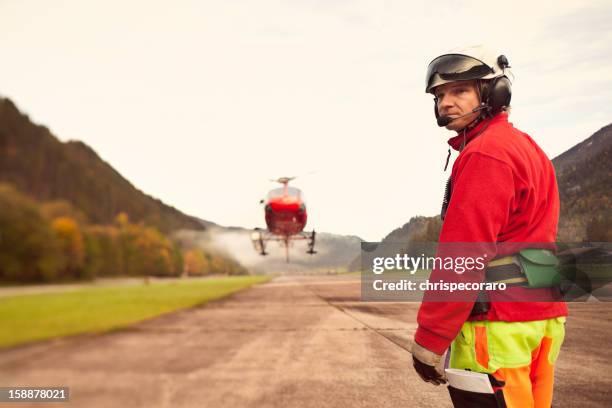 helicopter worker - air ambulance stock pictures, royalty-free photos & images