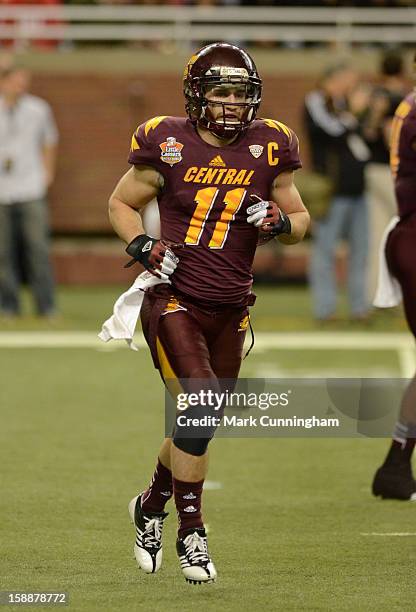 Cody Wilson of the Central Michigan University Chippewas looks on during the Little Caesars Pizza Bowl against the Western Kentucky University...